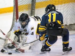 Austin Weir (31) of the Mitchell Pee Wees makes a save from in-close during action from the final game at the International Silver Stick ‘B’ championship game against Ilderton, a 2-0 loss. JEFF LOCKHART PHOTO