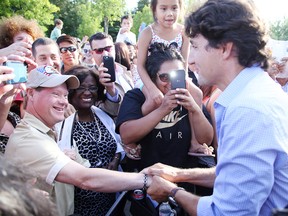 Gino Donato/Sudbury Star
Prime Minister Justin Trudeau greets well-wishers at a community barbecue on Monday. Trudeau and his ministers wrapped up a two-day cabinet retreat in Sudbury at Laurentian University.