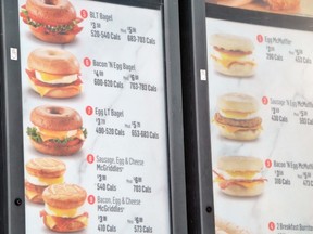 A McDonald's drive-thru menu conforms to new provincial legislation requiring all food chains with 20 locations or more to list the calories or range of calories in a meal.