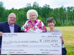 Supplied photo
Lily Fielding (centre) joins Mayor Brian Bigger and Ward 12 Coun. Deb McIntosh for a $1-nllion donation to Kivi Park.