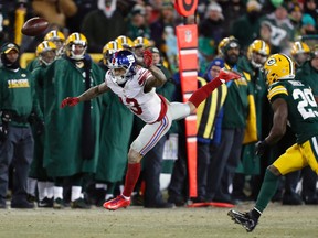 Giants wide receiver Odell Beckham (13) misses a reception during the second half of the NFC wild-card game against the Packers in Green Bay, Wis., on Sunday, Jan. 8, 2017. (Matt Ludtke/AP Photo)