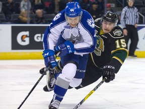 Sudbury Wolves overage forward CJ Yakimowicz battles London Knights' Cole Tymkin for the puck while during the first period of their OHL hockey game at Budweiser Gardens in London, Ont. last Saturday. Yakimowicz, Aiden Jamieson and Patrick Sanvido will remain with the Wolves following the OHL's overager trade deadline Monday at noon. Sudbury Wolves overage forward CJ Yakimowicz battles London Knights' Cole Tymkin for the puck while during the first period of their OHL hockey game at Budweiser Gardens in London, Ont. last Saturday. Yakimowicz, Aiden Jamieson and Patrick Sanvido will remain with the Wolves following the OHL's overager trade deadline Monday at noon. Derek Ruttan/The London Free Press/Postmedia Network