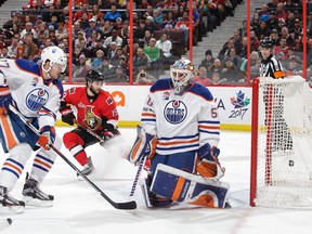 Derick Brassard of the Ottawa Senators watches the puck get past Edmonton Oilers goalie Jonas Gustavsson on a shot by Mark Stone (not shown). Ottawa went on to win 5-3 Sunday at Canadian Tire Centre, despite being outshot 38-18. (Getty Images)