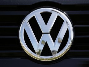 In this Sept. 21, 2015, file photo, a Volkswagen logo is seen on car offered for sale at New Century Volkswagen dealership in Glendale, Calif. The Volkswagen executive, Oliver Schmidt, who once was in charge of complying with U.S. emissions regulations has been arrested in connection with the company’s emissions-cheating scandal, a person briefed on the matter said Monday, Jan. 9, 2017. (AP Photo/Damian Dovarganes, File)