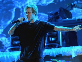 Justin Bieber performs poolside at Fontainebleau Miami Beachs New Years Eve Celebration at Fontainebleau Miami Beach on December 31, 2016 in Miami Beach, Florida. (Gustavo Caballero/Getty Images for Fontainebleau Miami Beach)