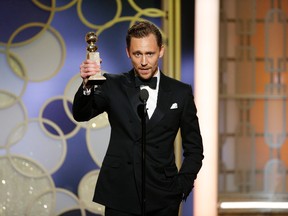 This image released by NBC shows Tom Hiddleston with the award for best actor in a limited series or TV movie for "The Night Manager," at the 74th Annual Golden Globe Awards at the Beverly Hilton Hotel in Beverly Hills, Calif., on Sunday, Jan. 8, 2017. (Paul Drinkwater/NBC via AP)