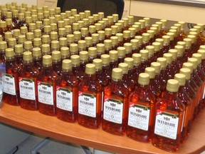Little Grand Rapids RCMP seized 202 bottles of whiskey, a bottle of vodka, and marijuana after a suspect brought booze into the dry community of Little Grand Rapids First Nation on Sunday. (RCMP PHOTO)