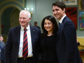 Maryam Monsef poses with Prime Minister Justin Trudeau and Gov.-Gen. David Johnston after being sworn in as Minister of Status of Women during a ceremony at Rideau Hall in Ottawa on Tuesday, Jan 10, 2017. THE CANADIAN PRESS/Sean Kilpatrick
