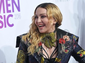 This file photo taken on December 9, 2016 shows Madonna attending the Billboard Women in Music 2016 event on December 9, 2016 in New York City.
Pop icon Madonna has described herself as "oppressed," saying she was tired of a gender double-standard over her relationships with younger men. The 58-year-old singer said in an interview published January 10, 2017 that she has endured criticism throughout her entire career despite her professional success. "I've always felt oppressed," she told Harper's Bazaar magazine.
/ AFP PHOTO / ANGELA WEISSANGELA WEISS/AFP/Getty Images