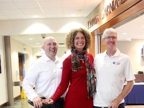 Jonathan Palumbo, left, Anita Trusler and Kenneth MacAlpine, with the Bluewater International Granfondo organizing committee, pose at the Tourism Sarnia-Lambton office in Point Edward Tuesday after announcing the second annual bike event is scheduled for Aug. 6. Organizers are hoping to attract 750 riders. Tyler Kula/Sarnia Observer/Postmedia Network