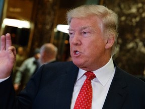 In this Jan. 9, 2017 file photo, President-elect Donald Trump talks with reporters at Trump Tower in New York. (AP Photo/Evan Vucci, File)