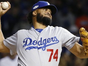 In this Oct. 22, 2016, file photo, Los Angeles Dodgers relief pitcher Kenley Jansen throws during the sixth inning of Game 6 of the National League baseball championship series against the Chicago Cubs, in Chicago. (AP Photo/Nam Y. Huh, File)