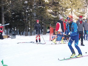 Ski-mountaineering athletes have specially designed skates and boots to not only make their equipment more lightweight but also make it easier to transition between uphill skiing and downhill skiing. | Andrew McCutcheon photo/Pincher Creek Echo