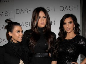 Kourtney Kardashian, Khloe Kardashian and Kim Kardashian attend the grand opening of Dash NYC on November 3, 2010 in New York City. (Photo by Marc Stamas/Getty Images)