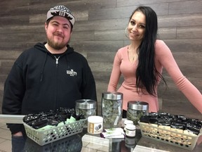 Staffers at the Weeds Glass & Gifts marijuana dispensary on Montreal Road, which reopened Jan. 9 after being closed because Canada Post seized cannabis shipments sent to the store from B.C. Left, staffer Brian, who declined to give his last name, and Kristina Simpson, who oversees both Weeds stores in Ottawa. JACQUIE MILLER / OTTAWA CITIZEN