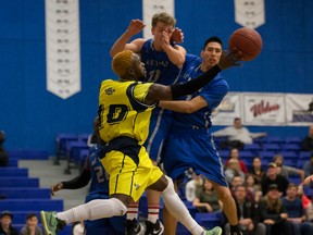 When the Keyano Huskies, shown here in recent action, show up to face the NAIT Ooks in ACAC basketball Friday and Saturday, both men’s and women’s teams can expect serious opposition. The male Ooks, reigning provincial and national college champions who lead in Northern Division standings, must bounce back from a pair of one-sided losses in exhibitions last weekend, while the female team, also reigning provincial champs, is already focused on the national finals on their home floor in February. (Supplied)