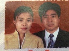 Xiu Jin Teng and husband Dong Huang are seen in a photo shown to court.