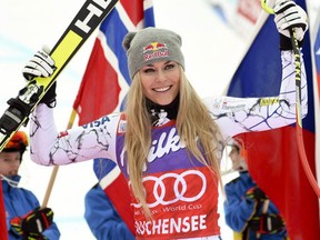 In this Jan. 9, 2016, file photo, Lindsey Vonn, of the United States, celebrates in the finish area after winning an alpine ski, women's World Cup downhill, in Altenmarkt-Zauchensee, Austria. (AP Photo/Pier Marco Tacca, File)