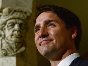 Prime Minister Justin Trudeau holds a press conference on Parliament Hill in Ottawa on Tuesday, Jan 10, 201., following a cabinet shuffle at Rideau Hall. (THE CANADIAN PRESS/Sean Kilpatrick)