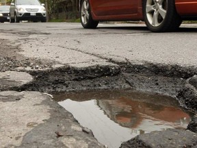 File photo of Ottawa potholes. JULIE OLIVER / POSTMEDIA