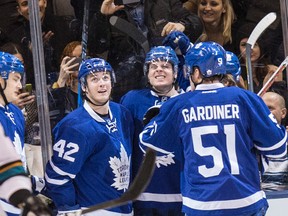 Maple Leafs centre Auston Matthews (centre) celebrates his goal against the Sharks during NHL action in Toronto on Dec. 13, 2016. (Craig Robertson/Toronto Sun)