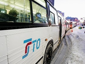 STO buses on Rideau St at Sussex Drive.