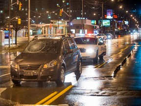 A man who was potentially fleeing robbers was struck by a car on Yonge Street, north of Finch Avenue, shortly after 11:15 p.m. on Wednesday, Jan. 11, 2017. (VICTOR BIRO/SPECIAL TO THE SUN)