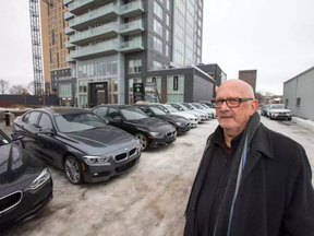 Gary Davis lives at 100 Champagne St. S. and he's not happy that Mastercraft Starwood wants to turn a future condo site at 115 Champagne into a parking lot for Otto's BMW. (Wayne Cuddington, Postmedia)