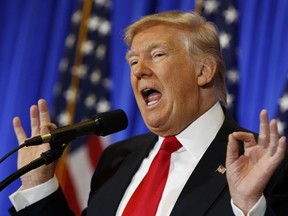 President-elect Donald Trump speaks during a news conference in the lobby of Trump Tower in New Yorks on Jan. 11.