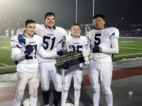Dennis Larocque, second from the left, stands with Catholic Central High School teammates after they won the WOSSAA junior boys' football championship Nov. 24 against Lucas Secondary School. The Woodstock local served as one of four team captains and was part of the last two Ontario Prospect Challenge prospect games. (Submitted photo)