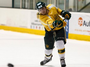 Tyson Baillie takes a shot during University of Alberta Golden Bears practice at Clare Drake Arena on Wednesday, Jan. 11, 2017. Baillie in leads all Canada West Conference freshmen in points. (Ian Kucerak)