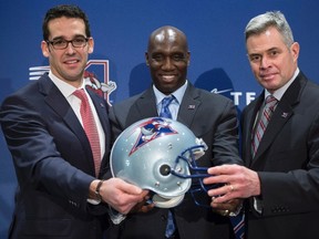 The Alouettes announced their front office heading into the 2017 season in December, naming (left to right) Patrick Boivin president, Kavis Reed general manager and Jacques Chapdelaine head coach. (Paul Chiasson/The Canadian Press)