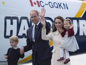 The Duke and Duchess of Cambridge and their children Prince George and Princess Charlotte get on a float plane as they prepare to leave Victoria, B.C., Saturday, Oct. 1, 2016. The British Columbia government spent more than $600,000 on the royal tour last fall of the Duke and Duchess of Cambridge and their two young children. (THE CANADIAN PRESS/Jonathan Hayward)