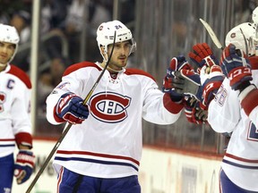 Phillip Danault of the Montreal Canadiens celebrates his second goal against the Winnipeg Jets kljlkjlkjk during NHL action on January 11, 2017 at the MTS Centre in Winnipeg, Manitoba. (Jason Halstead /Getty Images)