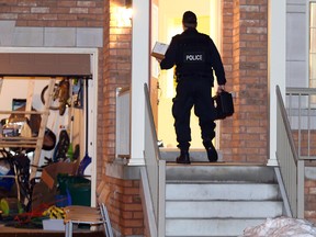 Police investigate an alleged drug lab in a Markham home on Thursday, Jan. 12, 2017. (Dave Abel/Toronto Sun)