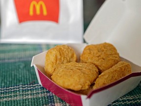 In this March 4, 2015 file photo, an order of McDonald's Chicken McNuggets is displayed for a photo in Olmsted Falls, Ohio. (AP Photo/Mark Duncan)