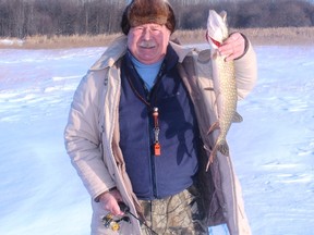 Neil with a “modest but feisty” Devil’s Lake pike