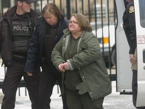 Elizabeth Wettlaufer is led into Woodstock court on Friday, Jan. 13, 2017. (Morris Lamont/The London Free Press/Postmedia Network)