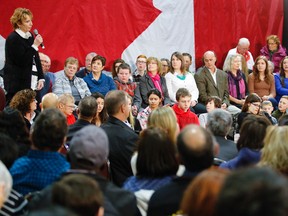 Prime Minister Justin Trudeau listens to comments from an emotional Kathy Katula, from Buckhorn, at a packed banquet hall at the Evinrude Centre on January 13, 2017 in Peterborough, Ont., at a town hall meeting that covered topics such as safe drinking water for First Nation communities, hydro rates and carbon taxes. (Clifford Skarstedt/Peterborough Examiner/Postmedia Network)