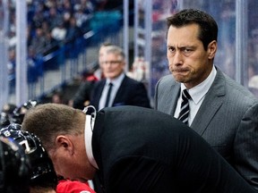 In this Oct. 4, 2016, file photo, Ottawa Senators head coach Guy Boucher looks on as his team takes on the Toronto Maple Leafs during an NHL pre-season game in Saskatoon, Saskatchewan. (Liam Richards/The Canadian Press via AP, File)