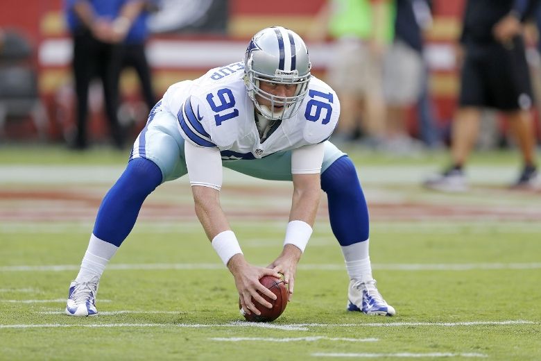 Dallas Cowboys long snapper L.P. LaDouceur (91) and quarterback