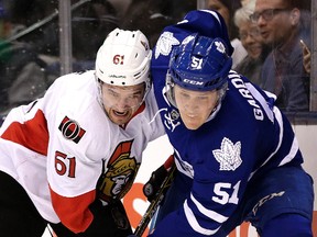 Sens' Mark Stone and the Leafs' Jake Gardiner square off in a game last season. (SUN FILES)