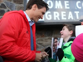 A young fan gets a photo of himself and Prime Minister Justin Trudeau signed outside Rhino's Roadhouse.
PETE FISHER/Northumberland Today