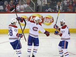 Phillip Danault, celebrating one of his two goals in Winnipeg earlier this week, has been one of the Habs' top producers this month, along with defenceman Nathan Beaulieu (left) and Alex Radulov. (Jason Halstead, Getty Images)