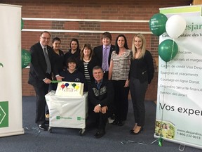 Students and staff at École secondaire du Sacré-Coeur in Sudbury, and staff from Desjardins Voyageurs Credit Union (Caisse Populaire Voyageurs) celebrated the 20th anniversary of Student Caisse with a barbecue in October 2016. Supplied photo