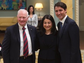 Governor General David Johnston and Prime Minister Justin Trudeau pose with Maryam Monsef, new minister of Status of Women, during a cabinet shuffle at Rideau Hall in Ottawa, Tuesday, January 10, 2017. (THE CANADIAN PRESS/Adrian Wyld)