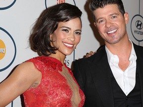 Paula Patton (L) and Robin Thicke are seen in 2014 file photo.  (Chelsea Lauren/Getty Images)