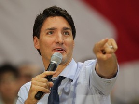 Prime Minister Justin Trudeau speaks during a town hall meeting at Alumni Hall, Western University on Friday, Jan. 13, 2017, in London, Ontario. THE CANADIAN PRESS/Dave Chidley