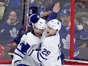 Toronto Maple Leafs forward Nazem Kadri is congratulated by teammate William Nylander during an NHL game against the Ottawa Senators at Canadian Tire Centre on Jan. 14, 2017. (Wayne Cuddington/Postmedia)