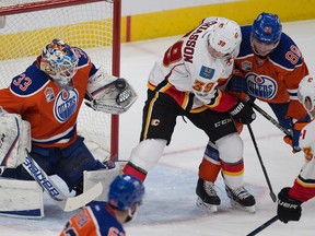 Oilers goaltender Cam Talbot makes a save in traffic against the Calgary Flames on Saturday, Jan 14, 2006 at Rogers Place.